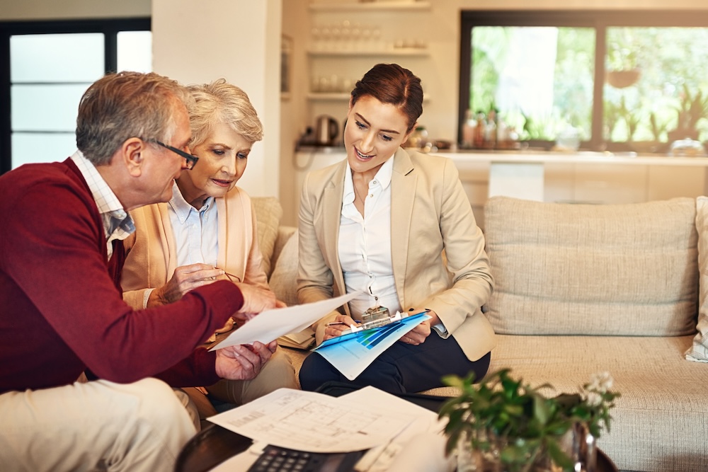 Shot of a senior couple getting advice from their financial consultant.